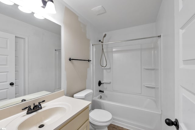 full bath with vanity, toilet, and shower / bathtub combination