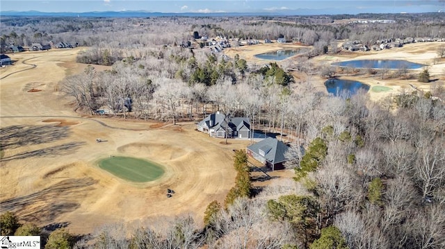 bird's eye view featuring view of golf course and a water view