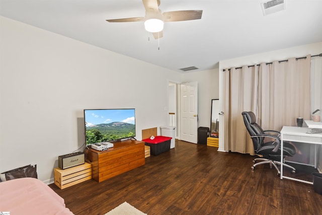 office with ceiling fan, wood finished floors, and visible vents