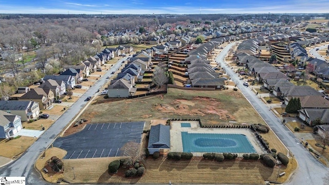 birds eye view of property with a residential view