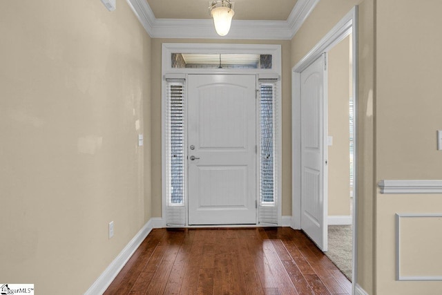 foyer featuring ornamental molding, baseboards, and dark wood-style floors