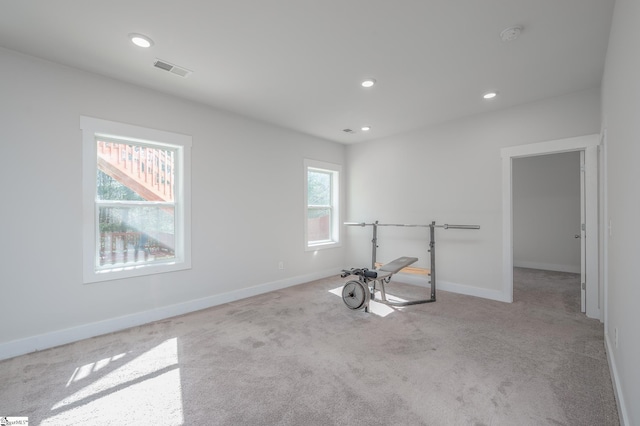 workout area with carpet floors, visible vents, baseboards, and recessed lighting