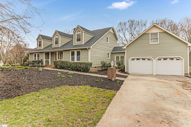 cape cod home featuring a porch, crawl space, and driveway