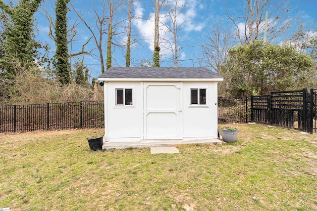 view of shed featuring a fenced backyard