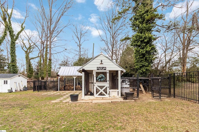 view of shed featuring a fenced backyard