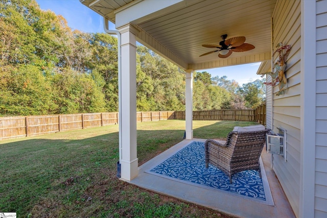 view of patio with a ceiling fan and a fenced backyard