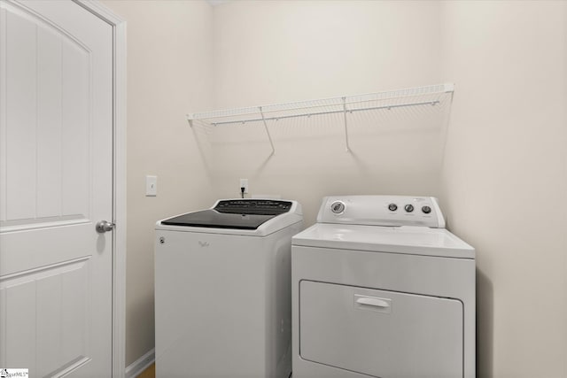 laundry room with laundry area and washer and dryer