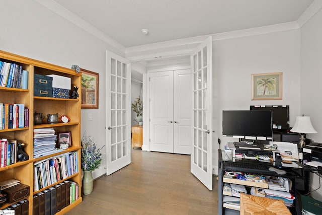 office area with french doors, wood finished floors, and crown molding