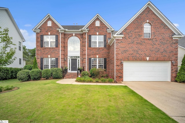 view of front facade featuring driveway, an attached garage, a front lawn, and brick siding