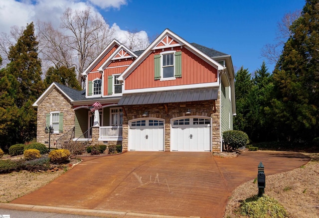 craftsman-style house featuring concrete driveway, stone siding, an attached garage, a porch, and board and batten siding