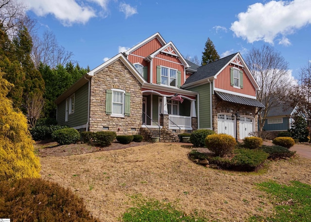 craftsman-style house with covered porch, board and batten siding, crawl space, a garage, and stone siding