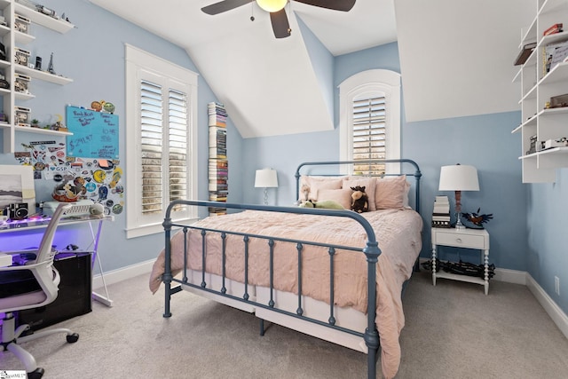 bedroom with lofted ceiling, carpet floors, ceiling fan, and baseboards