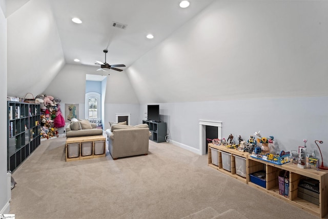 carpeted living area featuring ceiling fan, recessed lighting, visible vents, baseboards, and vaulted ceiling