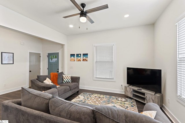 living room with ceiling fan, dark wood-type flooring, recessed lighting, and baseboards