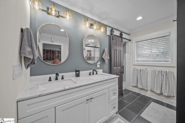 bathroom featuring tile patterned flooring, a sink, and crown molding