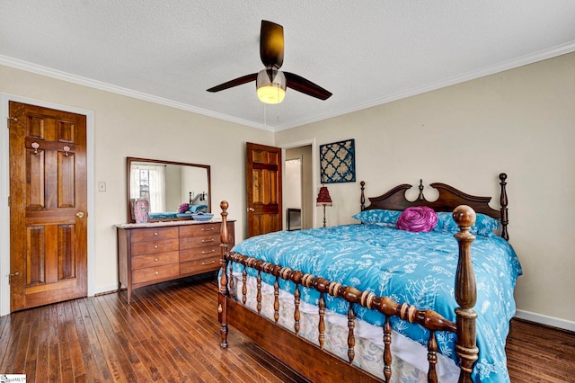 bedroom featuring dark wood-style floors, crown molding, a textured ceiling, and baseboards