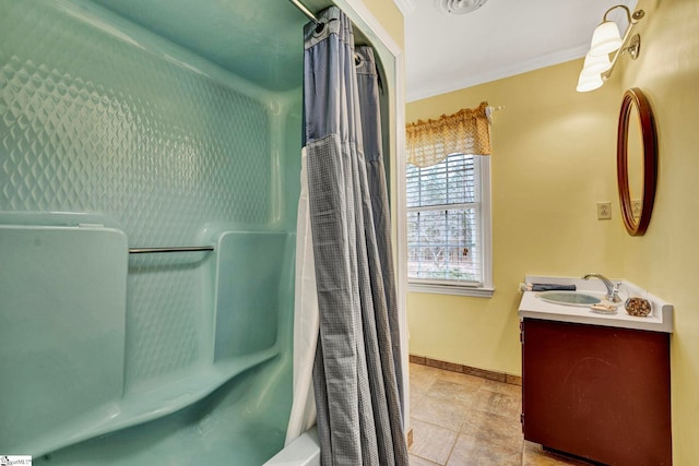 full bathroom featuring ornamental molding, shower / bathtub combination with curtain, vanity, and baseboards