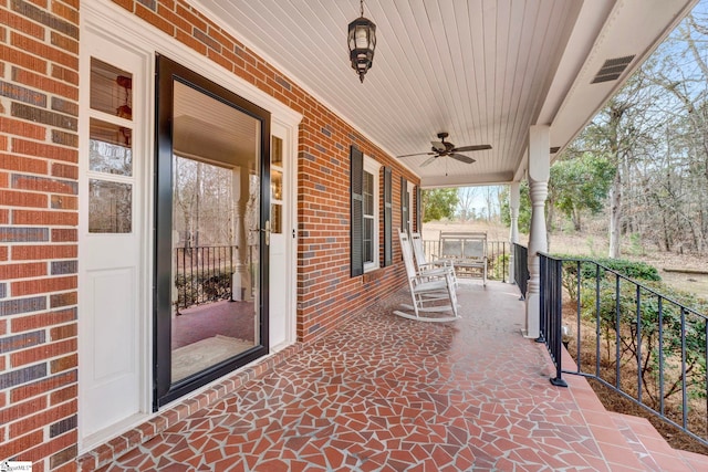 view of patio featuring covered porch and a ceiling fan