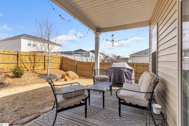 view of patio featuring a fenced backyard and area for grilling