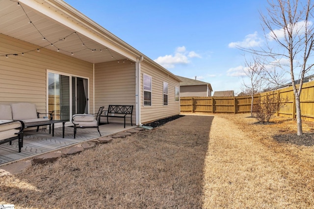 view of yard with a patio area and a fenced backyard