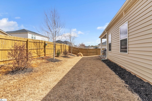 view of yard featuring a fenced backyard