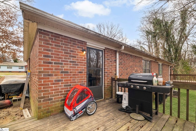 wooden terrace with area for grilling