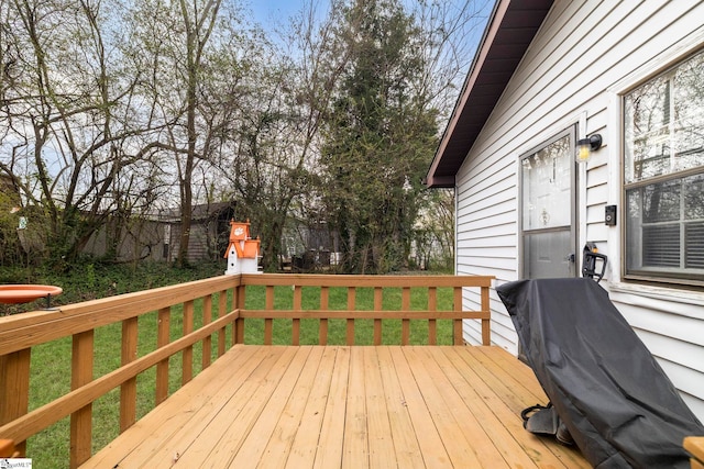 deck featuring a yard