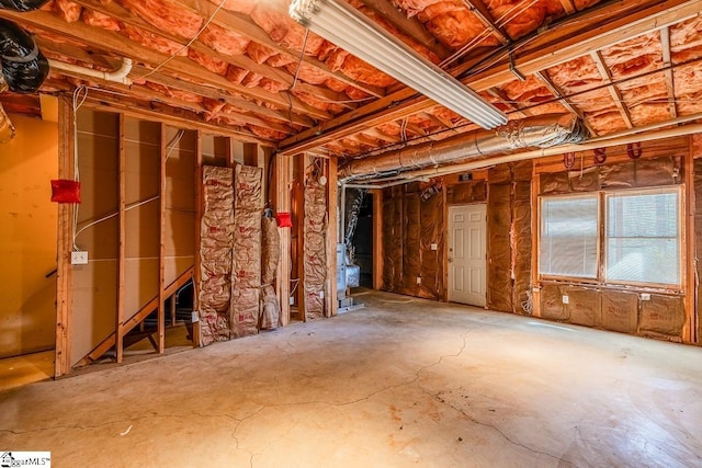 misc room featuring unfinished concrete floors