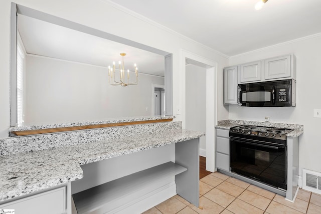 kitchen with light tile patterned flooring, crown molding, visible vents, black appliances, and an inviting chandelier