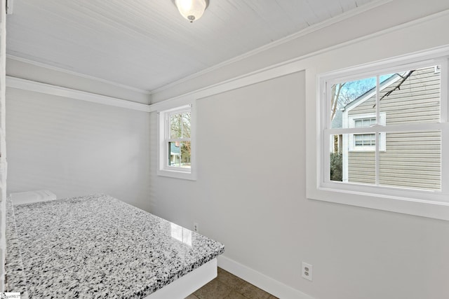 bedroom featuring baseboards and ornamental molding