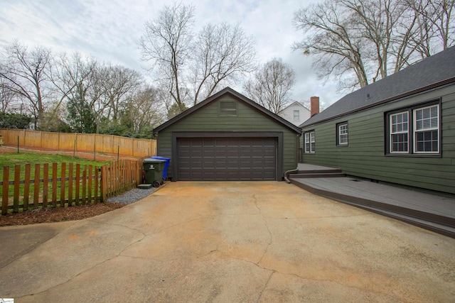 detached garage with fence