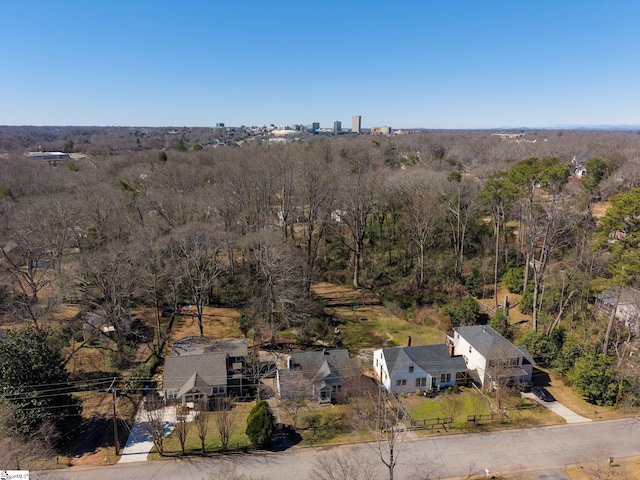 aerial view featuring a view of trees