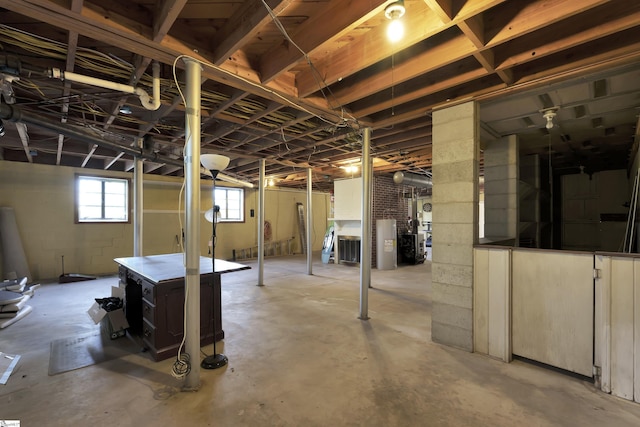 basement featuring electric water heater