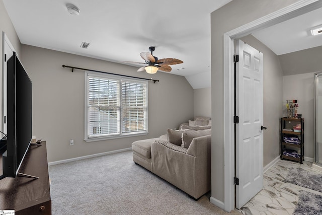 living room with lofted ceiling, marble finish floor, baseboards, and a ceiling fan