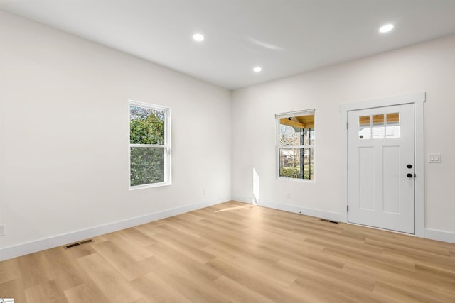 entrance foyer with recessed lighting, visible vents, and light wood-style flooring