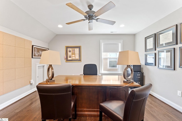 office featuring dark wood-style floors, visible vents, ceiling fan, and baseboards