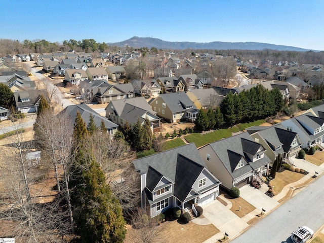 birds eye view of property with a residential view and a mountain view