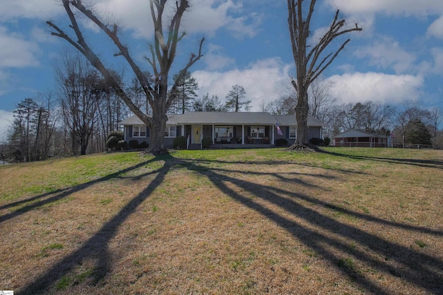 view of front of home with a front yard