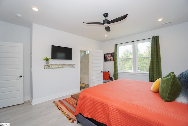 bedroom with light wood finished floors, baseboards, visible vents, and recessed lighting