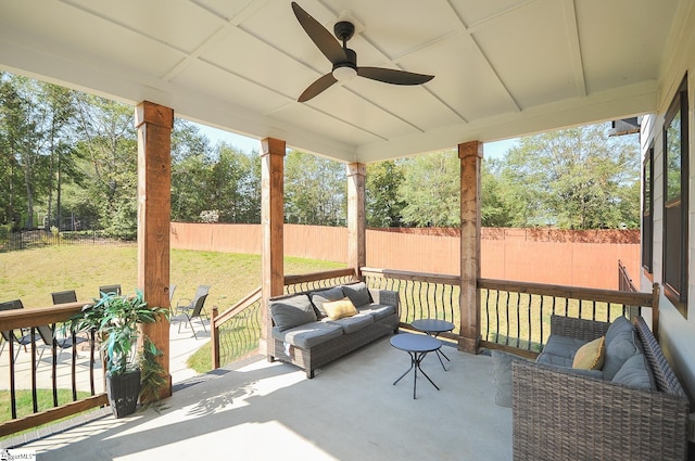 exterior space with a fenced backyard, ceiling fan, and an outdoor hangout area