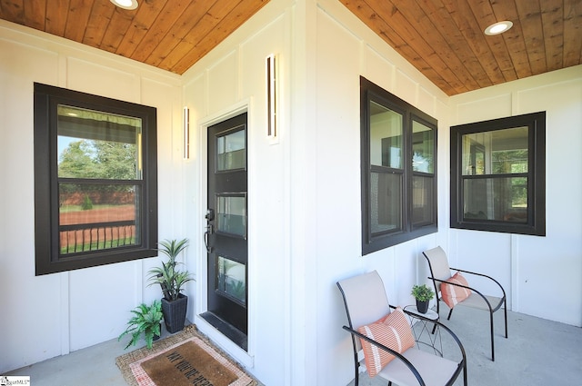 doorway to property featuring covered porch