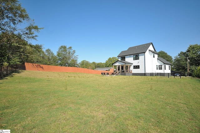 view of yard with fence