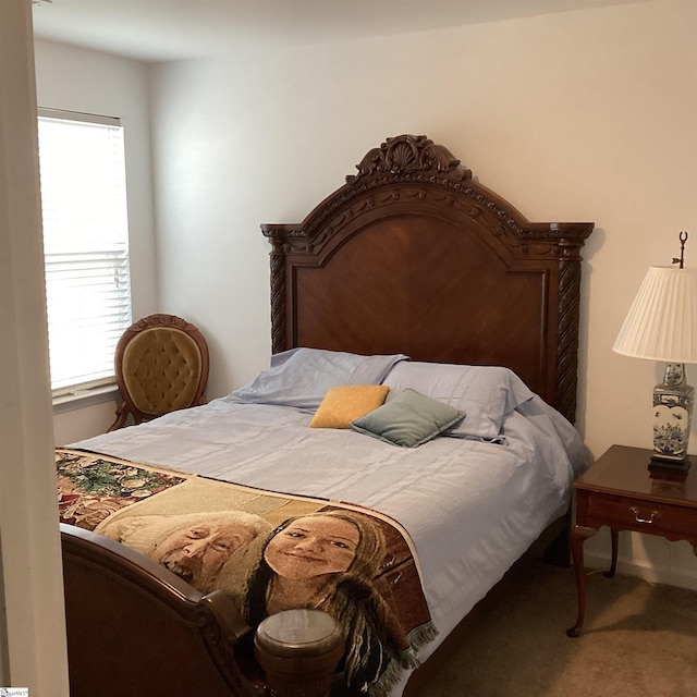 bedroom featuring carpet and multiple windows