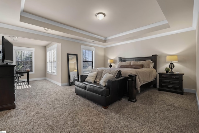 carpeted bedroom featuring a raised ceiling, visible vents, and baseboards