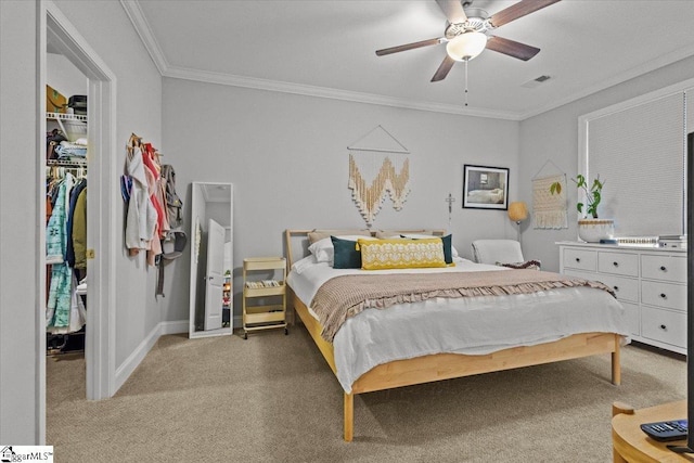 bedroom with a ceiling fan, visible vents, crown molding, and light carpet