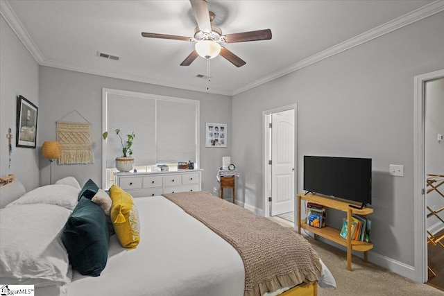 bedroom featuring ornamental molding, light colored carpet, visible vents, and baseboards