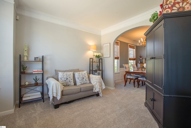 living area with light carpet, baseboards, arched walkways, crown molding, and a chandelier