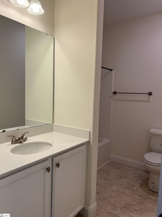 bathroom with shower / bath combination, vanity, and toilet