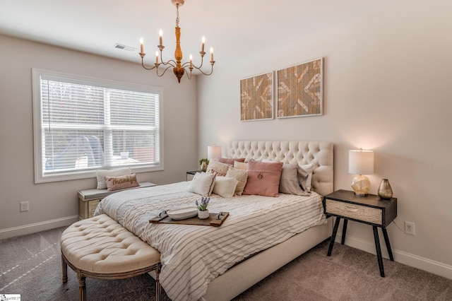 bedroom with carpet floors, a chandelier, visible vents, and baseboards