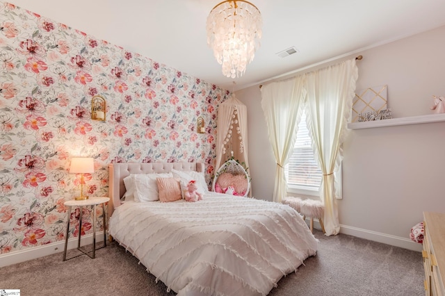 carpeted bedroom with an inviting chandelier, visible vents, and baseboards